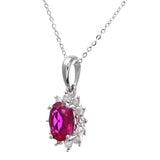 1.1ct Oval Ruby And 0.25ct Diamond Cluster Pendant In UK Hallmarked 9ct White Gold