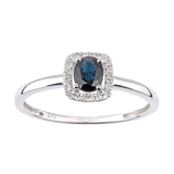 0.5ct Oval Sapphire And Round Diamond Halo Ring In UK Hallmarked 9ct White Gold