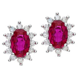 1.21ct Oval Ruby And 0.25ct Round Diamond Stud Cluster Earrings In 9ct White Gold