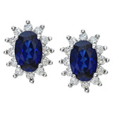 0.23ct Oval Sapphire And 0.25ct Round Diamond Stud Cluster Earrings In 9ct White Gold