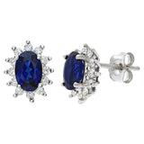 0.23ct Oval Sapphire And 0.25ct Round Diamond Stud Cluster Earrings In 9ct White Gold
