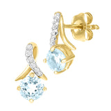0.5ct Round Blue Topaz And Pave Set Diamond Twist Earrings In 9ct Yellow Gold