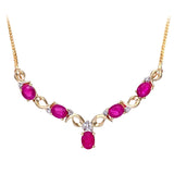 0.7ct Oval Ruby And Round Diamond Claw Set Necklace In UK Hallmarked 9ct Yellow Gold