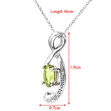 0.53ct Oval Peridot And Diamond Pendant In UK Hallmarked 9ct White Gold