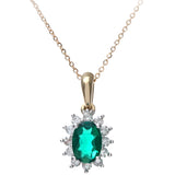 0.6ct Oval Emerald And 0.25ct Diamond Cluster Pendant In UK Hallmarked 9ct Yellow Gold