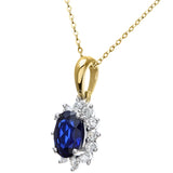 1.1ct Oval Sapphire And 0.25ct Diamond Cluster Pendant In UK Hallmarked 9ct Yellow Gold
