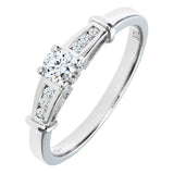 0.25ct Round Diamond Prong Set Side Stone Ring In UK Hallmarked 9ct White Gold