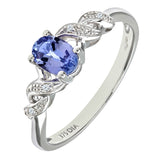 0.5ct Round Tanzanite Claw Set Ring With Diamond Pave Shoulders In UK Hallmarked 9ct White Gold
